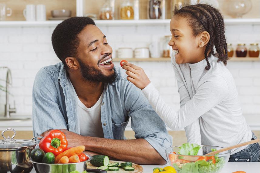 Person eating vegetables