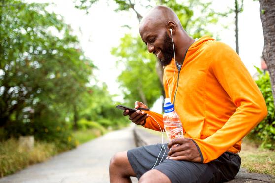 A man preparing to go jogging