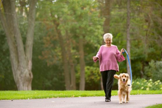 Woman walking with her dog