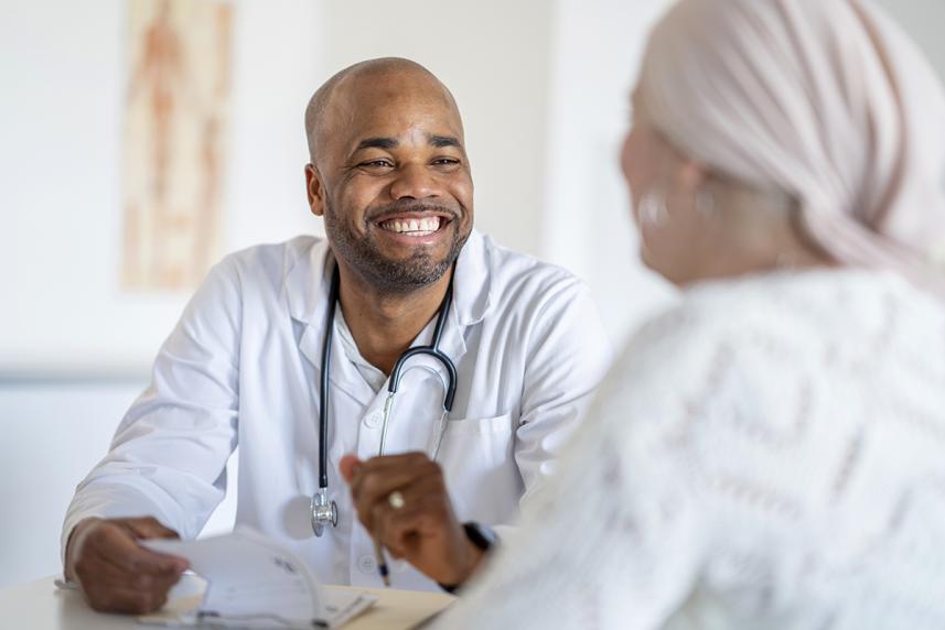 A doctor meeting with a patient