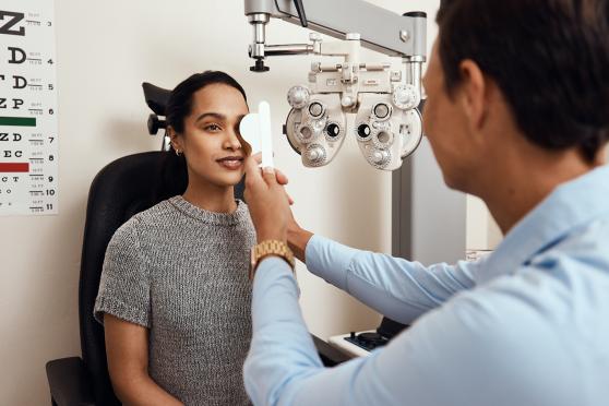 Woman having eyes examined