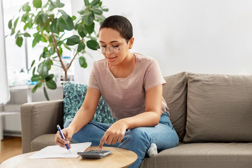 Person calculating their medical expenses for their tax deductions