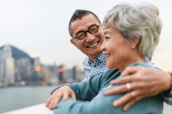 Mother and son near a river for an article on caring for someone with Alzheimer's disease