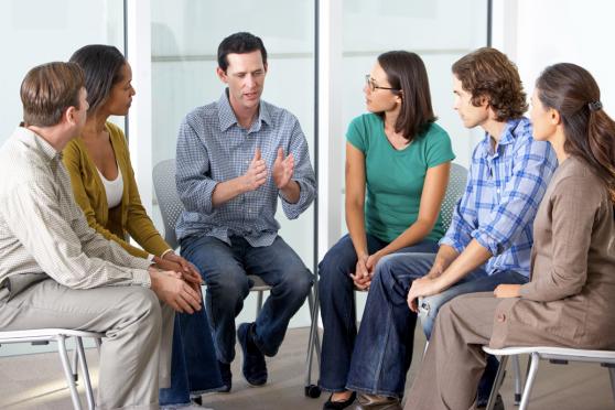 Six people in a support group for chronic illness