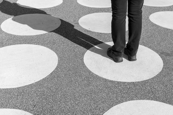 Person standing in white circle for an article on setting healthy boundaries