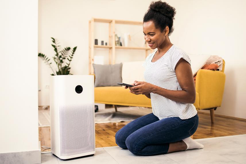 Person using a device to help with allergies