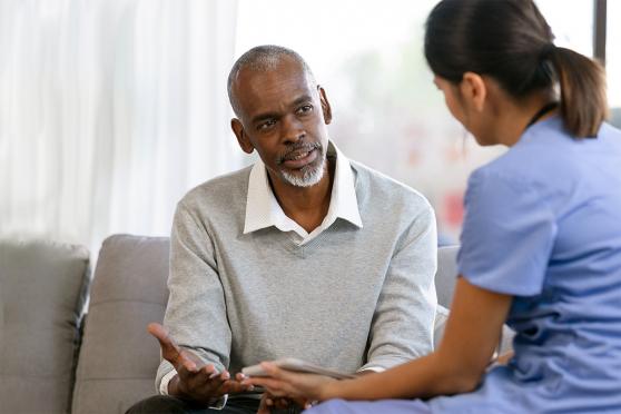 Man asking his doctor about cancer